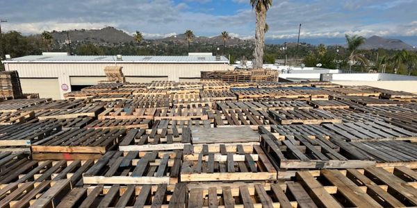 Industrial pallet yard aerial overhead view